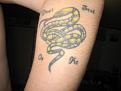 Snake
My second tattoo. This is based off the Gadsden and First Navy Jack flags. The quote from both flags is also my personal motto: "Don't Tread On Me."