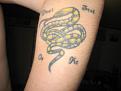 Snake
My second tattoo. This is based off the Gadsden and First Navy Jack flags. The quote from both flags is also my personal motto: "Don't Tread On Me."